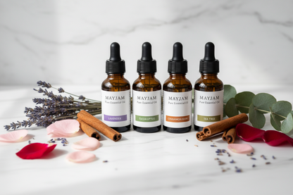 MAYJAM pure essential oils in amber glass bottles with botanicals